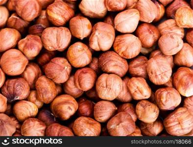 raw hazelnuts as background