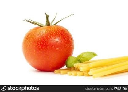 raw macaroni with basil and tomato. raw macaroni with basil and tomato on white background