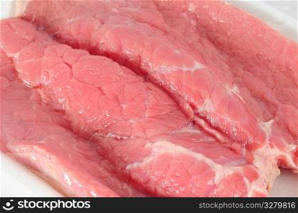 Raw meat.