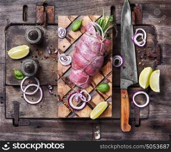 Raw meat, beef steak. Raw beef meat on cutting board with spices