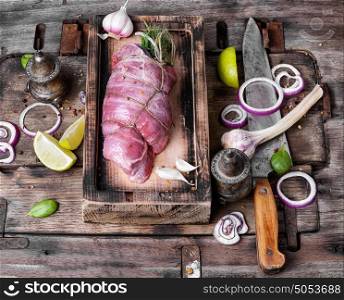 Raw meat, beef steak. Raw beef meat on cutting board with spices