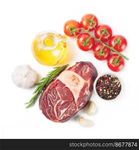 raw meat beef steak with bone, spices, rosemary and cooking ingredients isolated on white background. top view.. meat steak and cooking ingredients isolated on whtie background.
