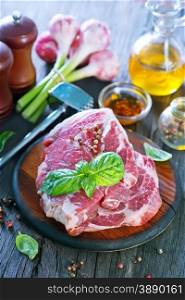 raw meat with aroma spice on a table