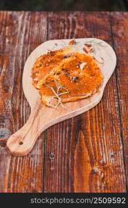 raw meat with herbs and rosemary ready for barbecue