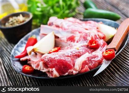 raw meat with salt and spice, raw meat on a table