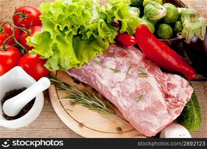 raw meat with vegetables and porcelain mortar