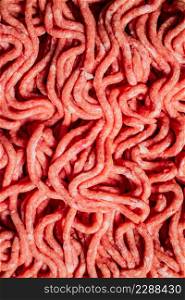 Raw minced fresh meat. Macro background. Texture of minced meat. High quality photo. Raw minced fresh meat. Macro background.