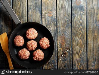Raw minced meat beef burger cutlets. Cooking meat and meatballs background with spices and salt