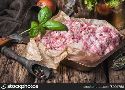 raw minced meat on vintage rustic background. raw minced meat beef