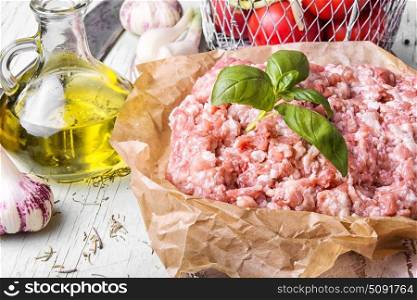 raw minced meat on vintage wooden background. fresh meat minced beef
