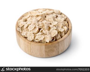 Raw oat cereal in a wooden bowl over white background with clipping path