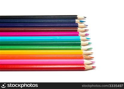 Raw of colored pencils with white isolation