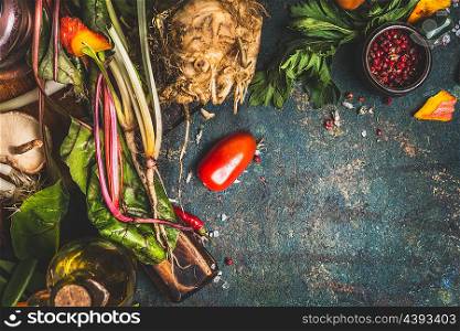 Raw organic vegetables from garden on dark background