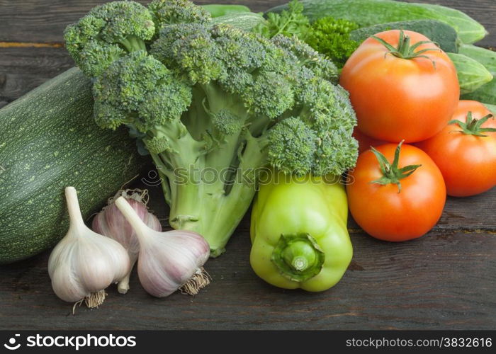 Raw organic vegetables on the wooden table