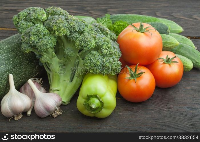 Raw organic vegetables on the wooden table