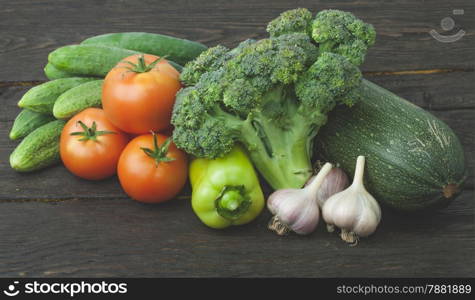 Raw organic vegetables on the wooden table