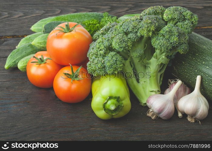 Raw organic vegetables on the wooden table