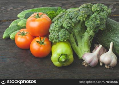 Raw organic vegetables on the wooden table