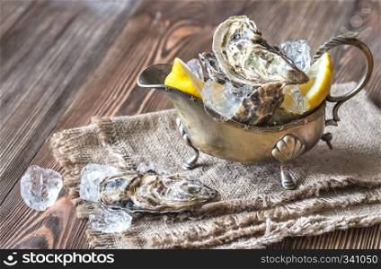 Raw oysters in the gravy boat