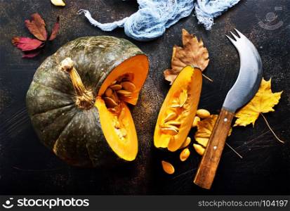 raw pampkin on a table, stock photo