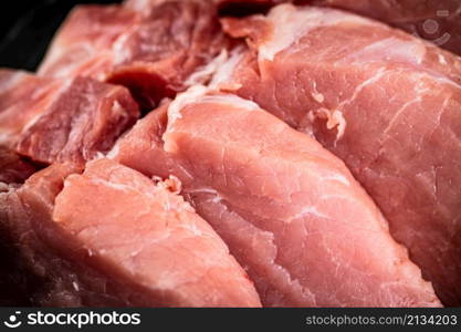 Raw pork. Macro background. The texture of the meat. High quality photo. Raw pork. Macro background. The texture of the meat.