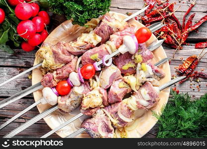 Raw pork meat on skewer,prepared for frying