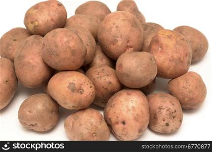 raw potatoes isolated on white background