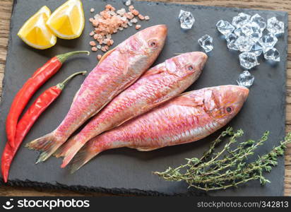 Raw red mullet with ingredients