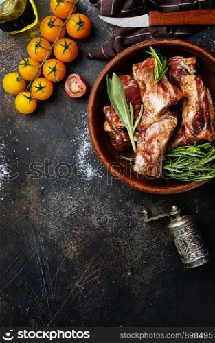 Raw ribs meat with herbs, salt, spices and other ingredients