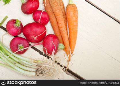 raw root vegetable on a rustic white wood table