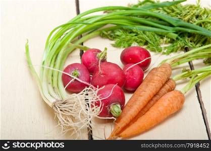 raw root vegetable on a rustic white wood table