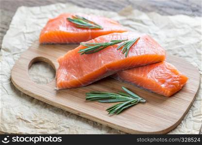 Raw salmon on the wooden board