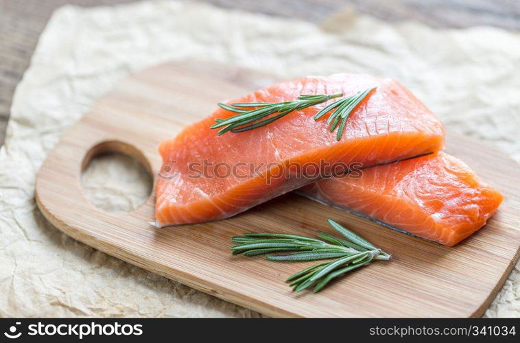 Raw salmon on the wooden board