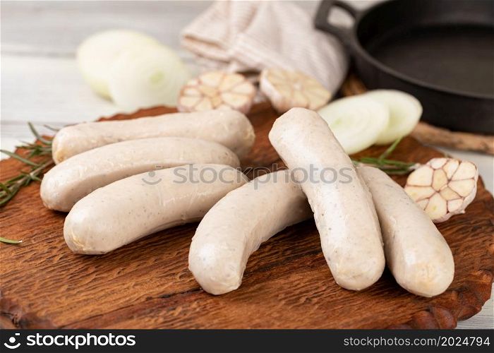 raw sausage isolated on white background. raw pork sausage