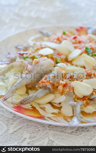raw shrimp in spicy fish sauce. fresh raw shrimp in fish sauce with chili and garlic