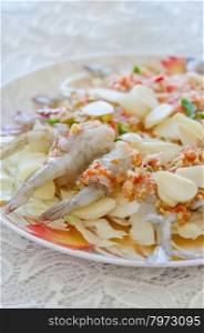 raw shrimp in spicy fish sauce. fresh raw shrimp in fish sauce with chili and garlic