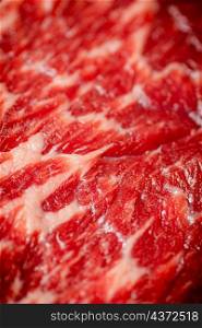 Raw steak pulp. Macro background. The texture of the meat. High quality photo. Raw steak pulp. Macro background.