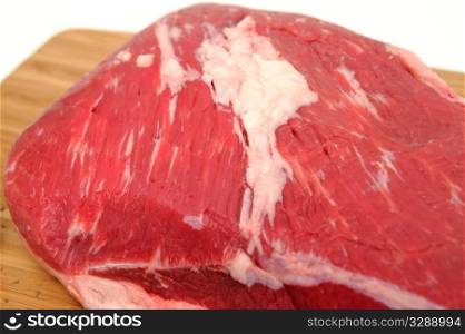 Raw Tri Tip Roast. Fresh raw tri-tip roast with fat marbled through the meat ready to roast or barbeque