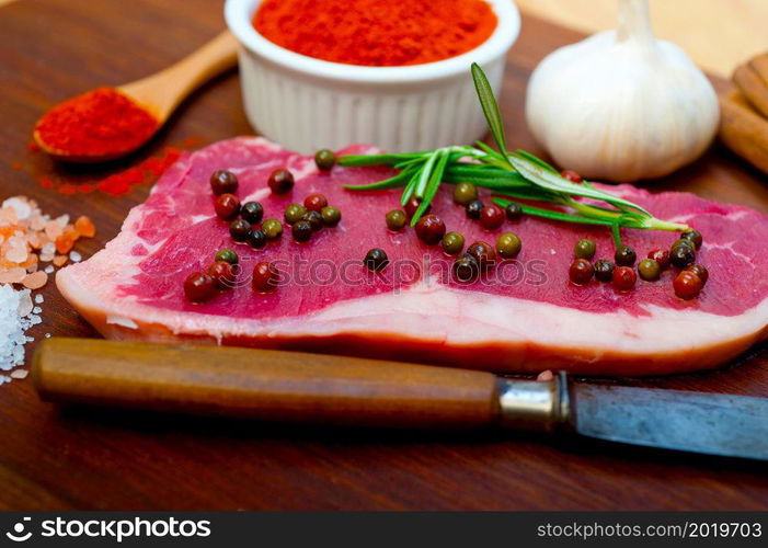 raw uncooked ribeye beef steak butcher selection