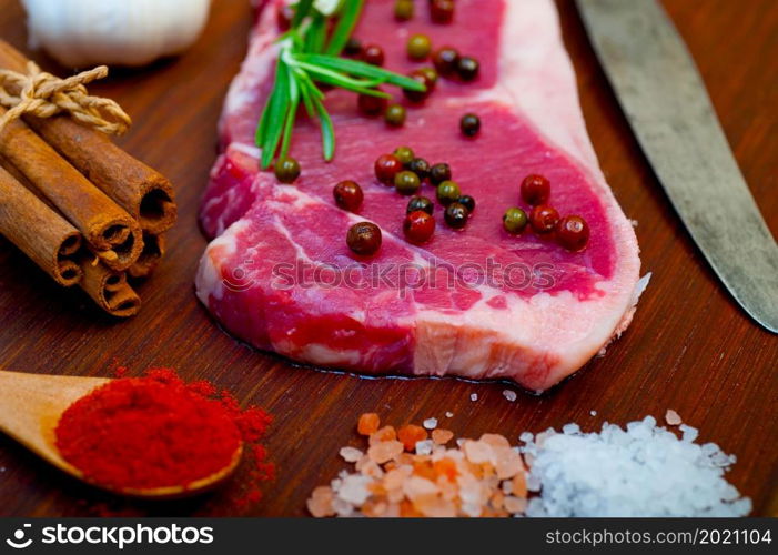 raw uncooked ribeye beef steak butcher selection