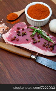 raw uncooked ribeye beef steak butcher selection