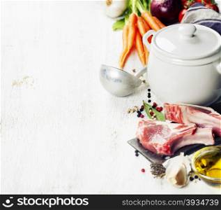 Raw vegetables and meat set with herbs and spices, ingredient for broth or soup, food background