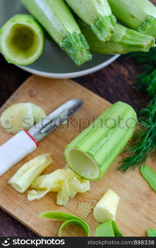 Raw zucchini for dinner in the kitchen.It is preparation for cooking