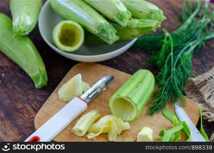 Raw zucchini for dinner in the kitchen.It is preparation for cooking