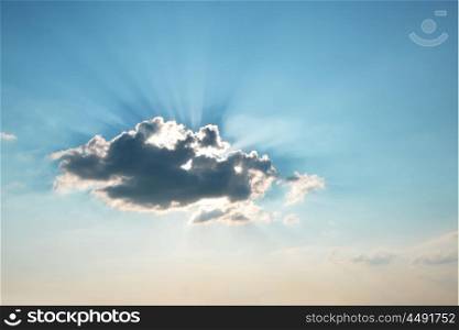 rays of sun breaking through cloud