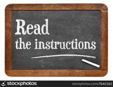 Read the instructions advice on a vintage slate blackboard
