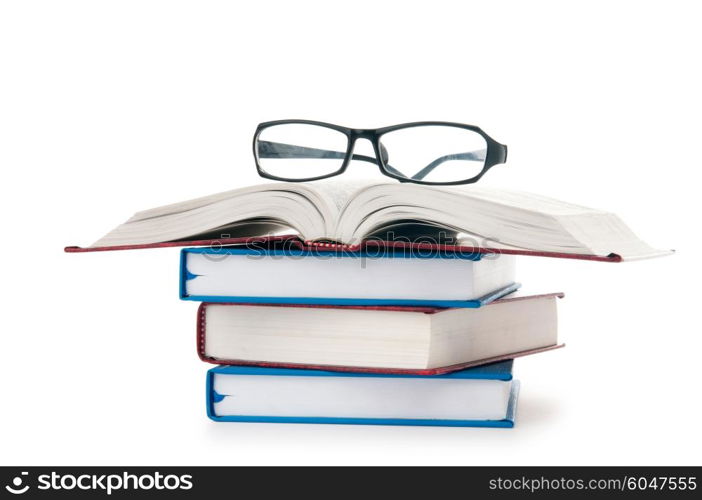 Reading glasses with books isolated on the white