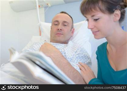 reading the patient a book