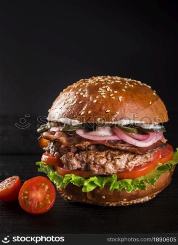 ready be served classic hamburger with cherry tomatoes 1 . Resolution and high quality beautiful photo. ready be served classic hamburger with cherry tomatoes 1 . High quality and resolution beautiful photo concept