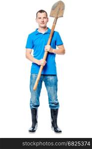 ready for work! Farmer in full length on a white background with a shovel